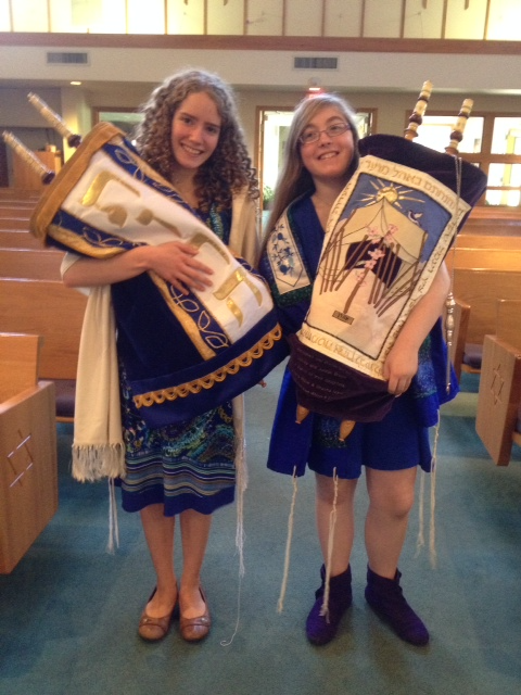 Same kids at their b'nai mitzvot with Torahs